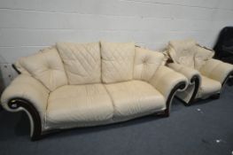 A CREAM LEATHER THREE PIECE LOUNGE SUITE, comprising a sofa, length 225cm x depth 95cm x height