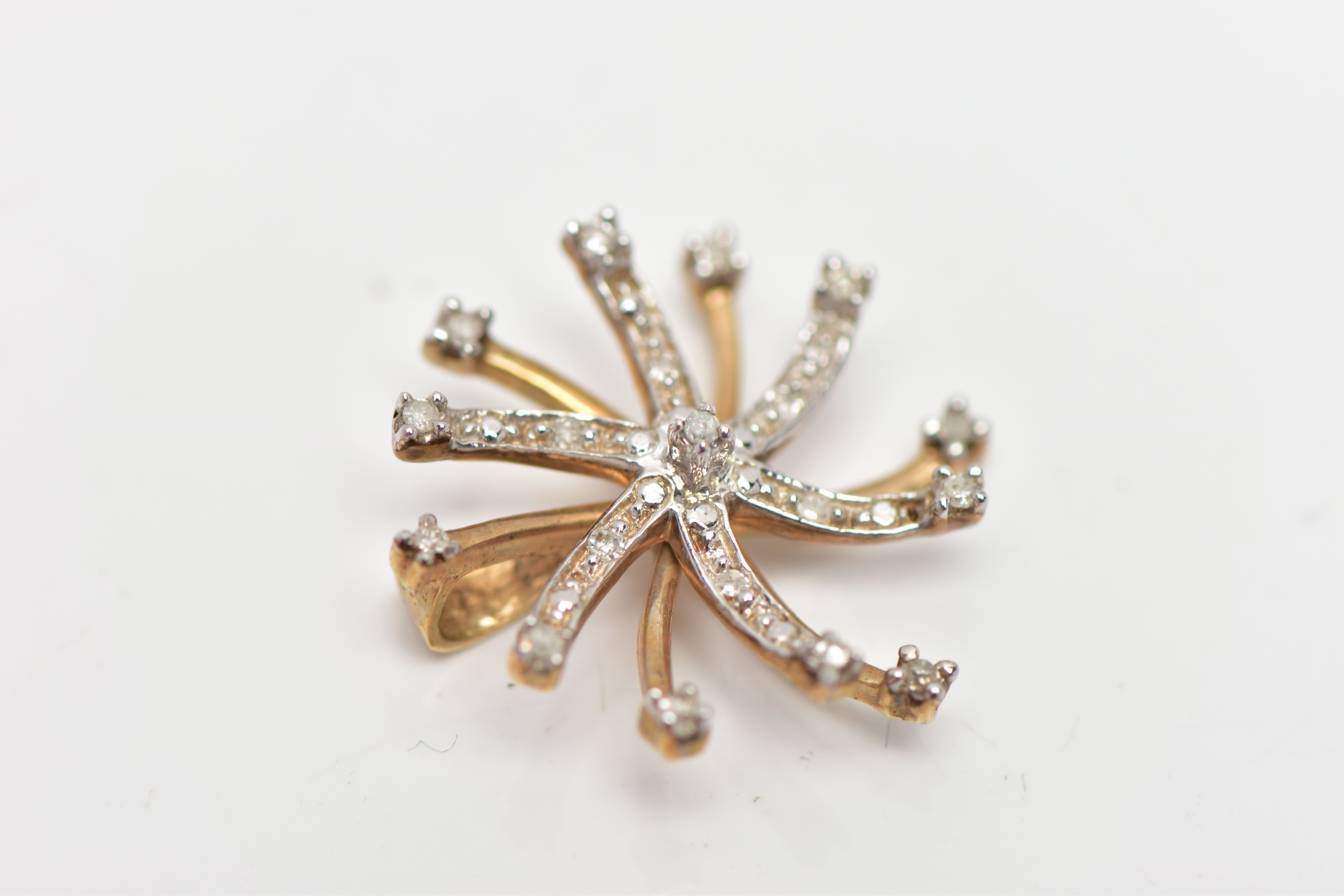 A 9CT GOLD DIAMOND SWIRL PENDANT, of scrolling design, the single cut diamond spray, with - Image 2 of 5