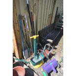 A SELECTION OF GARDEN HAND TOOLS, to include rakes, brushes, loppers, etc, along with a hose reel