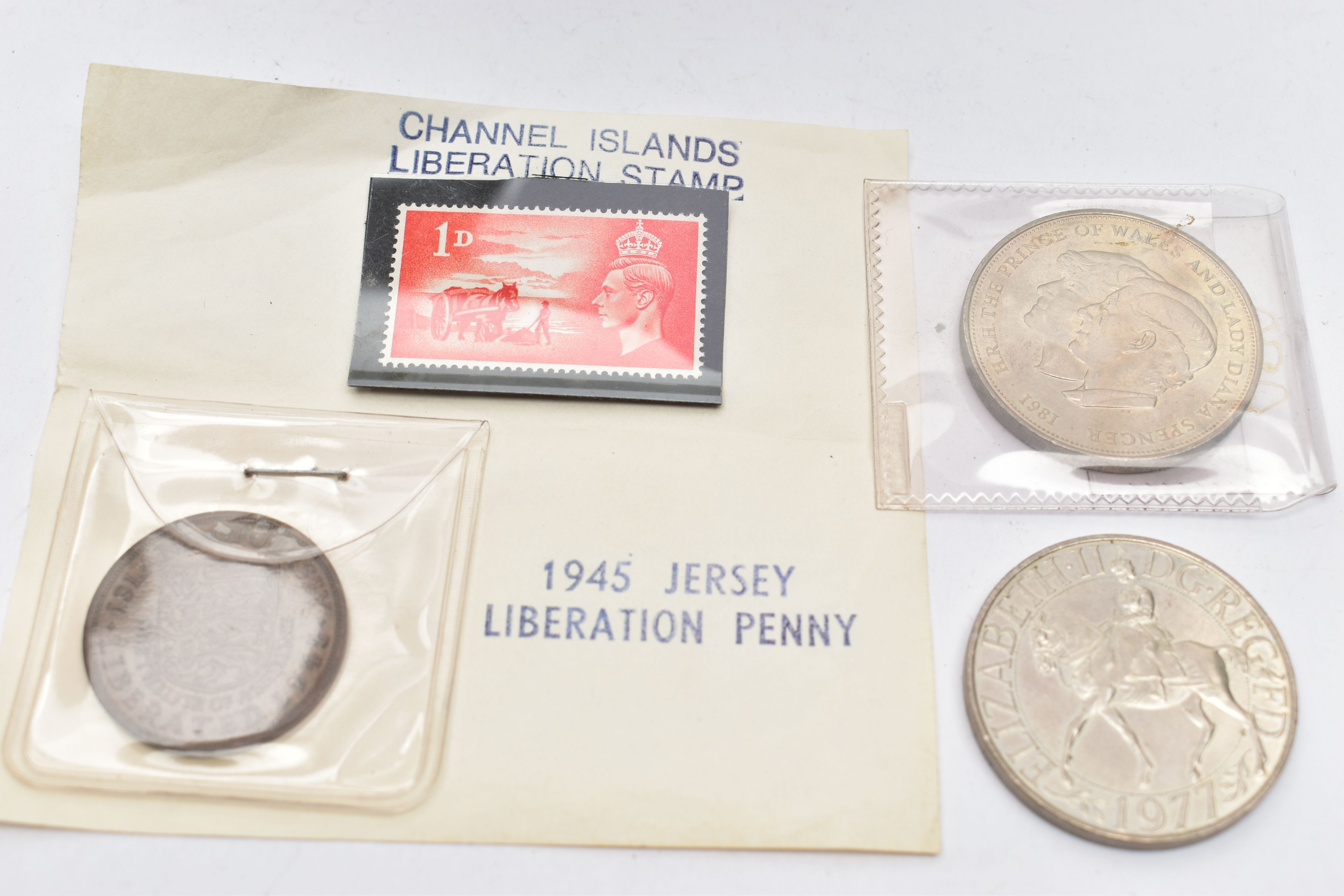 A SILVER CIGARETTE BOX AND COMMEMORATIVE COINS, rectangular cigarette case with an engine turned - Image 3 of 3
