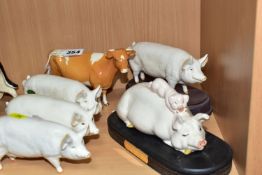 A BESWICK GUERNSEY COW, SECOND VERSION, MODEL NO. 1248B AND FIVE BESWICK PIGS, comprising 'Piggy