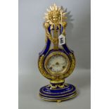 A MARIE-ANTIONETTE PORCELAIN CLOCK, a Victoria and Albert museum reproduction mantle clock, cobalt