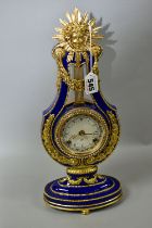 A MARIE-ANTIONETTE PORCELAIN CLOCK, a Victoria and Albert museum reproduction mantle clock, cobalt