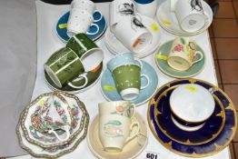 A COLLECTION OF SUSIE COOPER DESIGN COFFEE CUPS AND SAUCERS AND TWO OTHER TRIOS, the Susie Cooper to