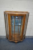 AN ART DECO WALNUT CHINA CABINET, with two glass shelves, and a mirror back, width 88cm x depth 33cm