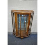 AN ART DECO WALNUT CHINA CABINET, with two glass shelves, and a mirror back, width 88cm x depth 33cm