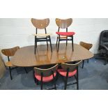 A MID CENTURY G PLAN E.GOMME TOLA AND BLACK EXTENDING DINING TABLE, with one additional leaf,