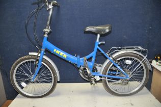 A RALEIGH IKEA FOLDING BICYCLE with footstand and rear shelf/rack