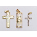 THREE YELLOW METAL PENDANTS, to include a 9ct gold tanzanite cross, hallmarked 9ct Sheffield, a