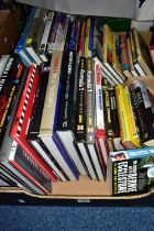 MOTOR RACING BOOKS, two boxes containing approximately thirty-five titles to include Formula 1
