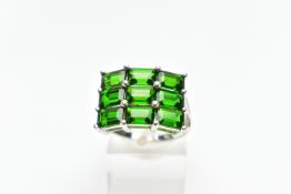 A 9CT WHITE GOLD CHROME DIOPSIDE DRESS RING, comprising nine rectangular cut chrome diopside, each