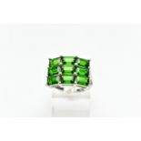 A 9CT WHITE GOLD CHROME DIOPSIDE DRESS RING, comprising nine rectangular cut chrome diopside, each