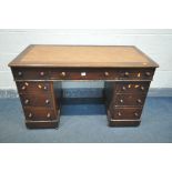 A VICTORIAN MAHOGANY PEDESTAL DESK, with an arrangement of nine drawers, on casters, width 119cm x