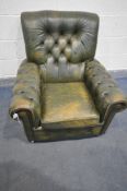 A GREEN BUTTONED LEATHER ARMCHAIR (this chair does not comply with the Furniture and Furnishings