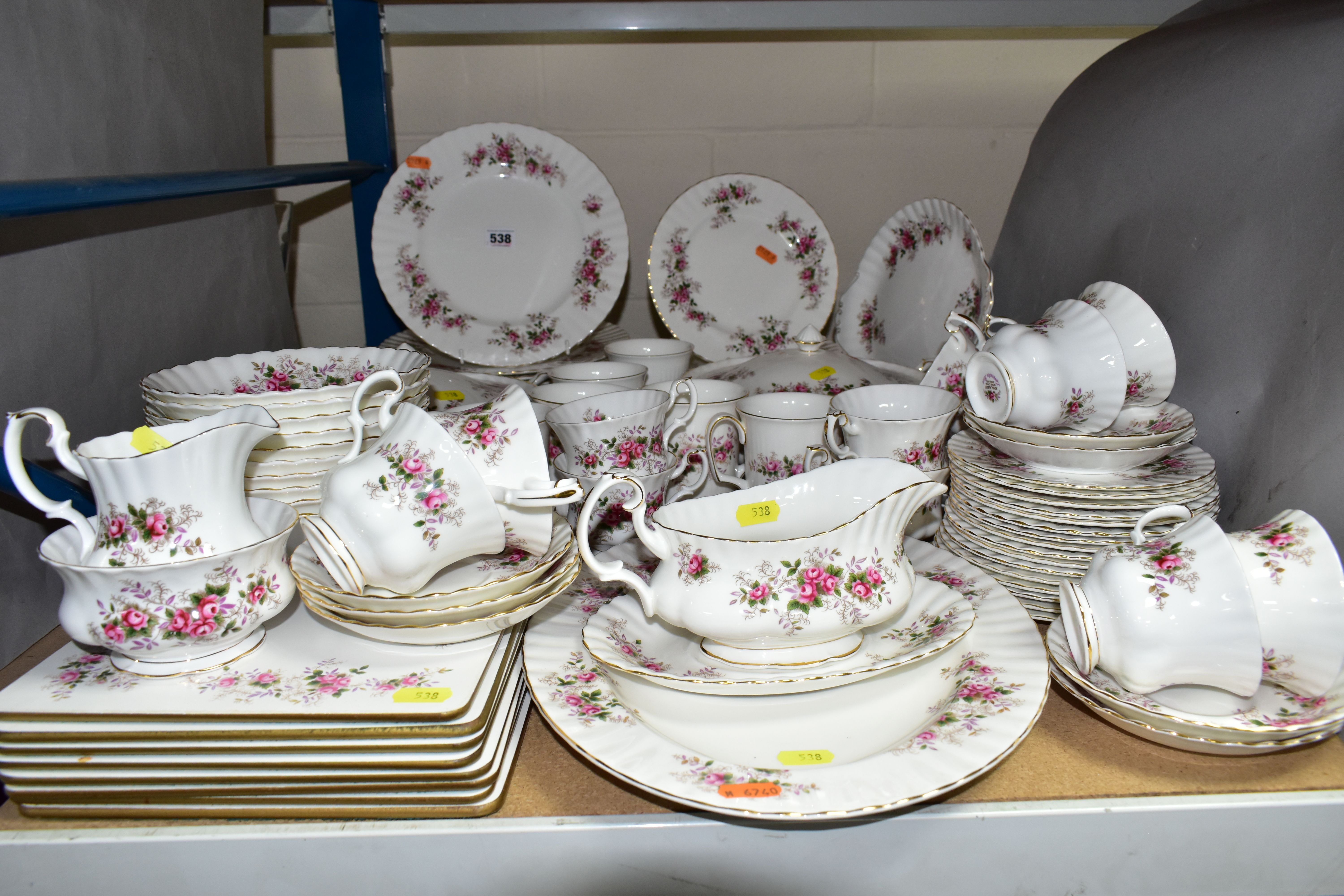 A ROYAL ALBERT 'LAVENDER ROSE' PATTERN DINNER SET, comprising ten dinner plates, ten side plates,