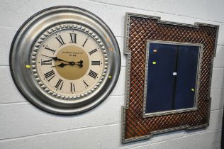 A DECORATIVE FRAMED WALL MIRROR, 101cm squared, and a large Madison clock Co wall clock (2)