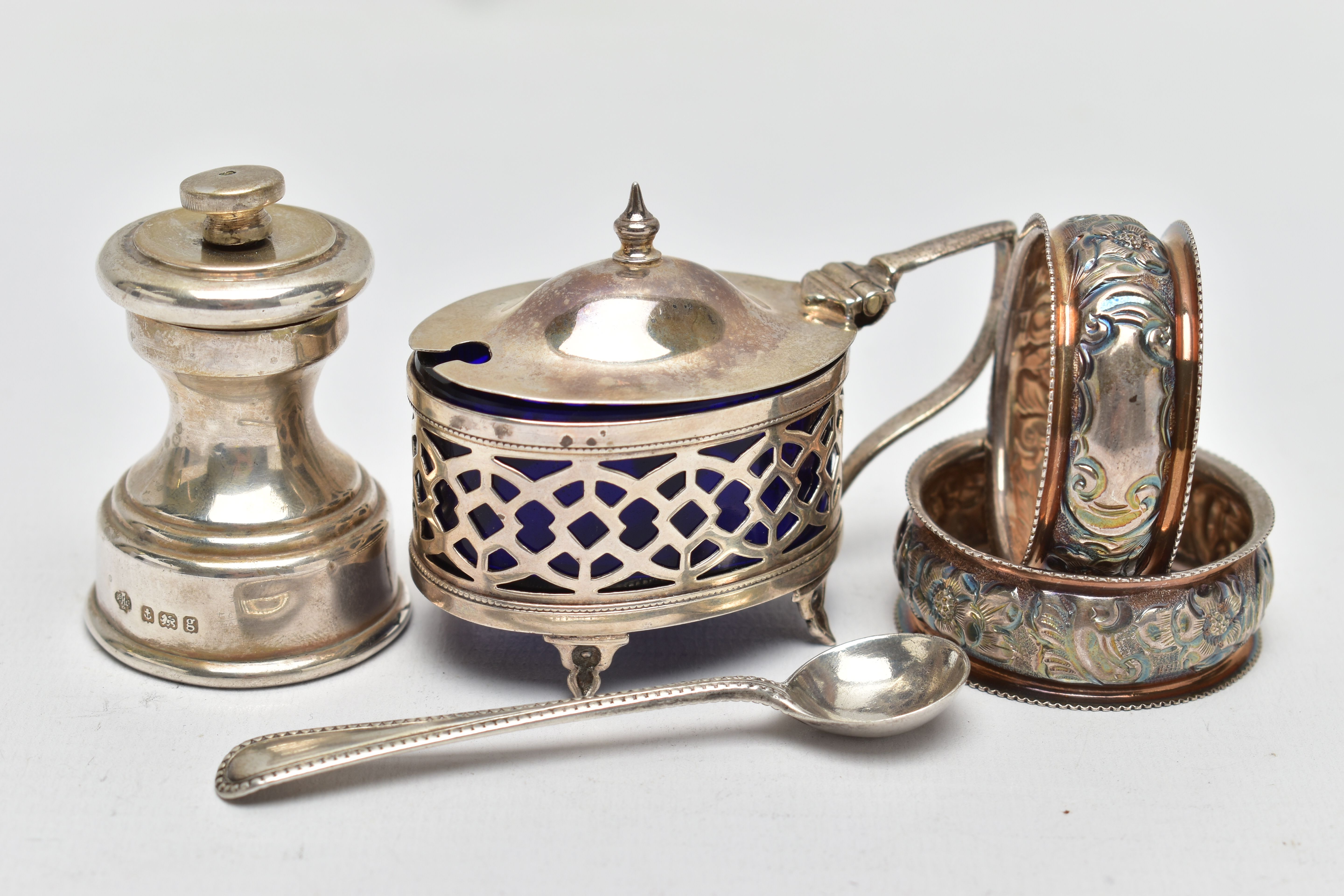 AN ASSORTMENT OF SILVER ITEMS, to include a matching pair of floral napkin rings, hallmarked