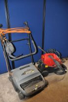 A CHAMPION CPW1600 PRESSURE WASHER with hose and lance along with a Champion SKU49545 scarifier (