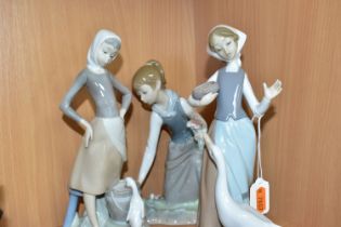 THREE LLADRO FIGURES OF GIRLS SCULPTED BY VINCENTE MARTINEZ, comprising Feeding Time / Girl with