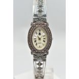 A LADIES SILVER WRISTWATCH, the oval mother of pearl dial, with Roman numeral markers, dial with