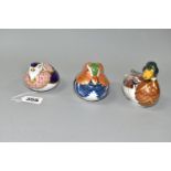 THREE ROYAL CROWN DERBY PAPERWEIGHTS, comprising Quail, gold stopper, Mandarin Duck, silver