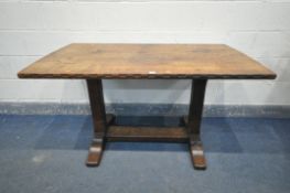 A 20TH CENTURY SOLID ELM REFECTORY TABLE, the table top that's adzed and carved geometric pattern to