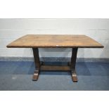 A 20TH CENTURY SOLID ELM REFECTORY TABLE, the table top that's adzed and carved geometric pattern to