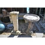 A COMPOSITE BRICK EFFECT SUN DIAL, 23cm squared x height 73cm, and a composite circular bird bath,