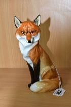 A ROYAL WORCESTER FIGURE OF A SEATED SLY LOOKING FOX, model no. 2993, black printed mark, height