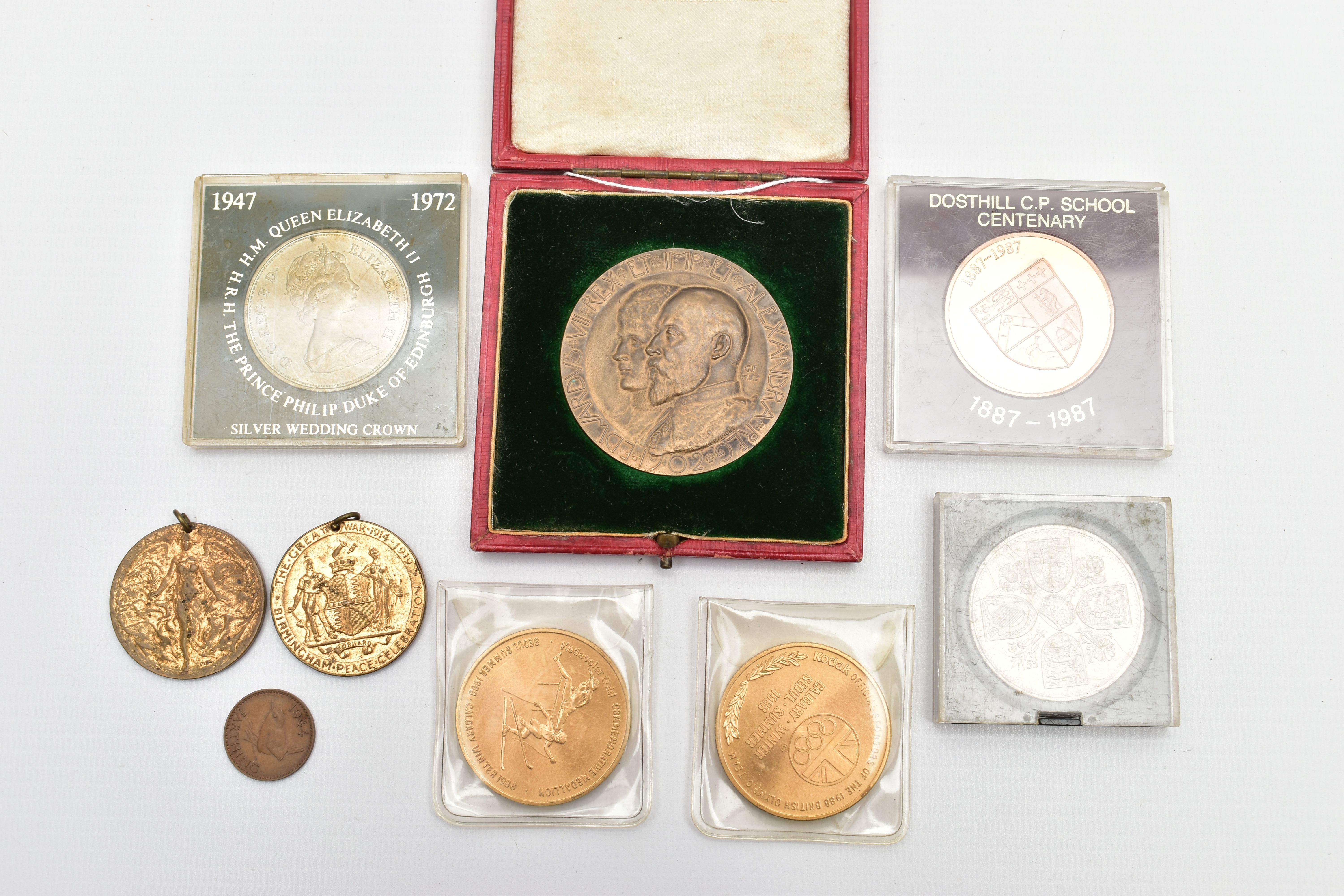 A COLLECTION OF MEDALS AND COINS, to include a cased medal in commemoration of King Edward VII and