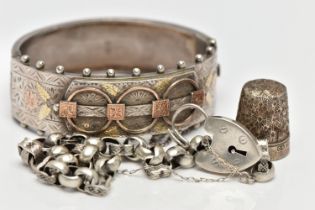 A LATE VICTORIAN SILVER HINGED BANGLE, 'CHARLES HORNER' THIMBLE AND A BRACELET, the bangle decorated