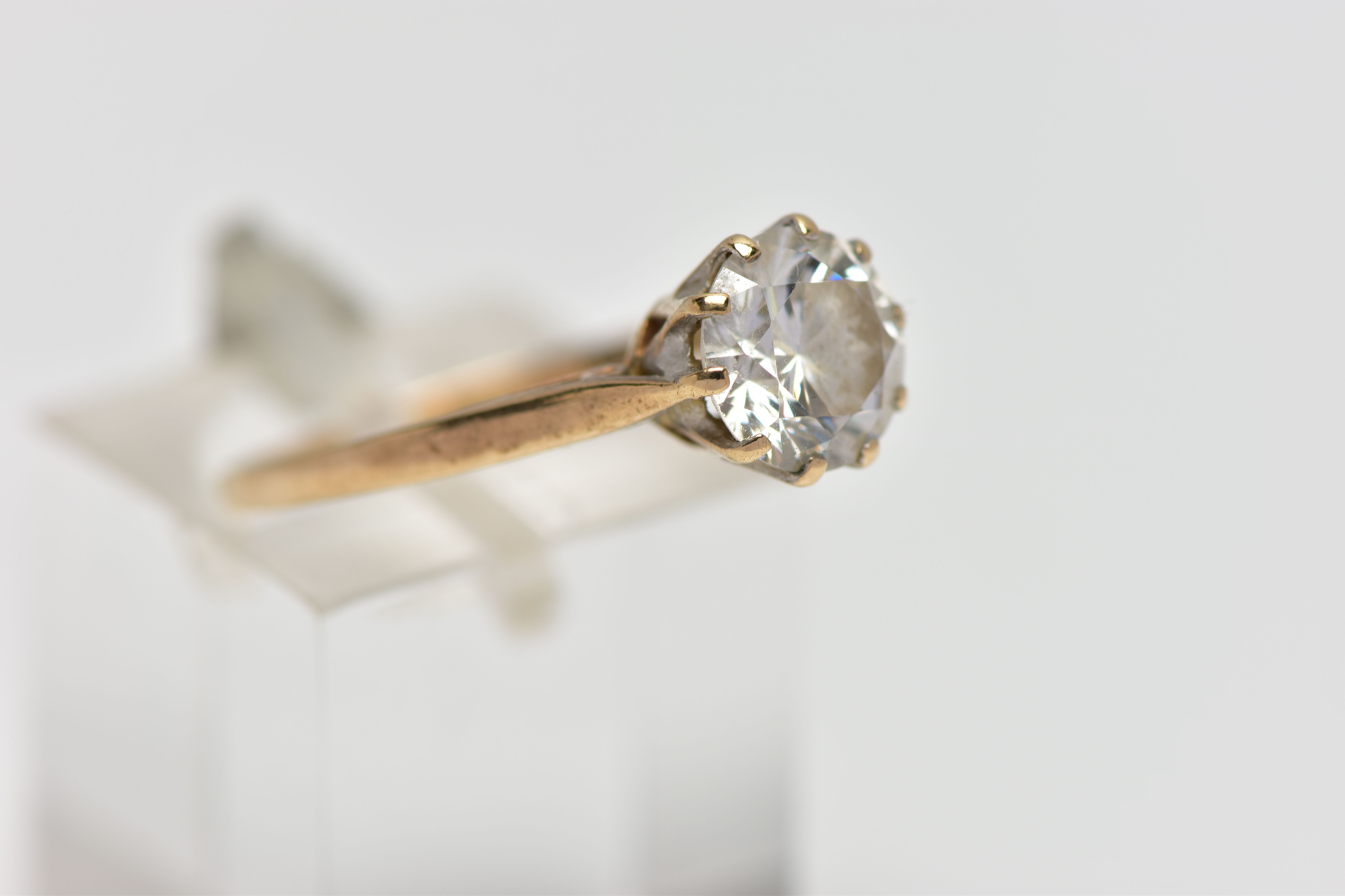 A 9CT GOLD SINGLE STONE RING, circular cut colourless cubic zirconia in a ten claw setting, - Image 4 of 4