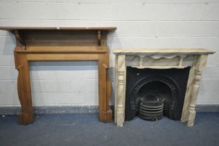 A 20TH CENTURY OAK FIRE SURROUND, width 155cm x height 142cm, and a marbleized fire surround,