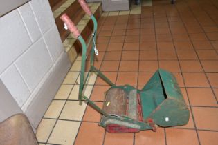A BOX AND LOOSE TOYS, a child's vintage Webb Miniature lawnmower and a twin wheeled wheelbarrow
