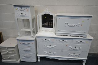 A MATCHING WHITE BEDROOM SUITE, to include a sideboard/chest of seven drawers, width 135cm x depth