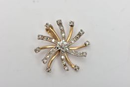 A 9CT GOLD DIAMOND SWIRL PENDANT, of scrolling design, the single cut diamond spray, with