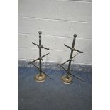 A PAIR OF BRASS JEWELLEY HOLDERS, with three adjustable graduated tiers, height 75cm
