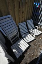 A SET OF FOUR ROVERGARDEN FOLDING SUN LOUNGERS, and a matching table (5)