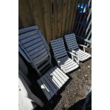 A SET OF FOUR ROVERGARDEN FOLDING SUN LOUNGERS, and a matching table (5)