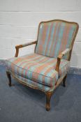 A LOUIS XV STYLE ARMCHAIR, with stripped upholstery and open armrests, width 72cm x depth 76cm x