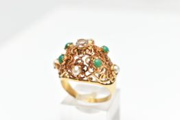 A YELLOW METAL GEM SET RING, set with a colourless sapphire, four chrysoprase cabochons and four