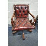 A MAHOGANY SWIVEL OFFICE CHAIR, with red buttoned leather
