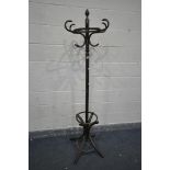 A STAINED BEECH BENTWOOD STYLE COAT/HAT STAND, height 190cm