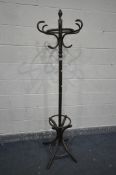 A STAINED BEECH BENTWOOD STYLE COAT/HAT STAND, height 190cm