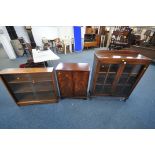 AN OAK GLAZED TWO DOOR BOOKCASE, width 92cm x depth 33cm x height 111cm (key) along with a teak