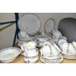 A PARAGON 'BELINDA' PATTERN DINNER SERVICE, comprising ten dinner plates, ten side plates, one bread