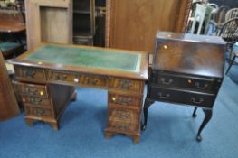 A MAHOGANY PEDESTAL DESK, with a green leather writing surface, and eight assorted drawers, width