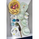 THREE AYNSLEY FRUIT DESIGN DINNER PLATES, WEDGWOOD SUSIE COOPER DESIGN COFFEE WARES, A PALE GREEN