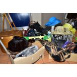 FOUR BOXES OF LADIES HANDBAGS AND HATS, to include over twenty ladies handbags, fur hats, three