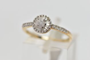 A 9CT YELLOW AND WHITE GOLD DIAMOND CLUSTER RING, set with a principal round brilliant cut